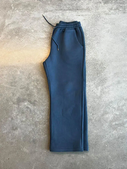 Herr löst sittande träningsoverall