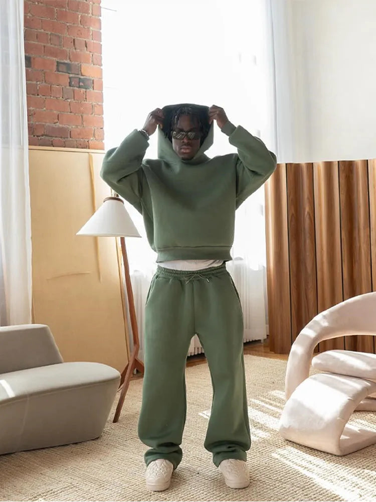 Herr löst sittande träningsoverall