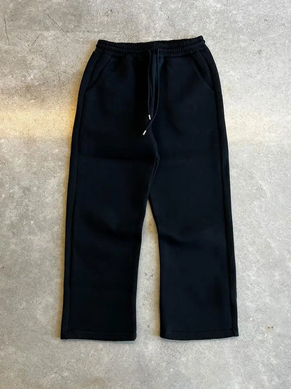 Herr löst sittande träningsoverall